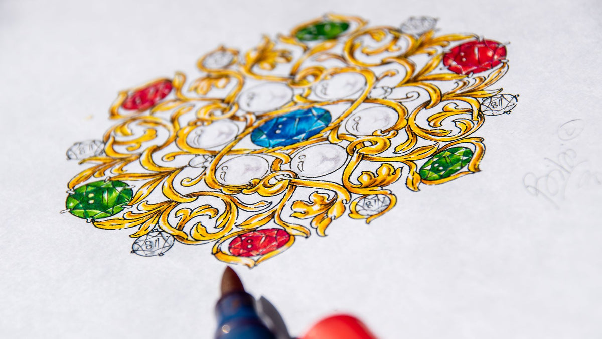 Close-up of brush pen illustration depicting an intricate brooch design