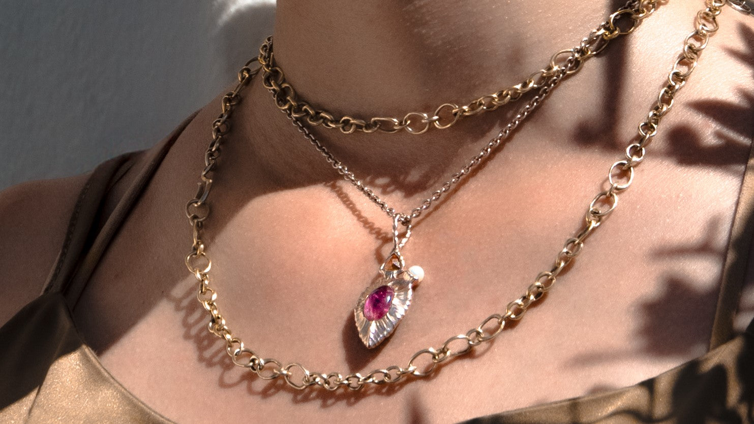 Necklace layering style on a woman