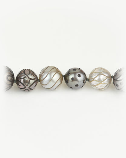 Close-up reveal of Tahitian pearls to show the hand-crafted precision on each