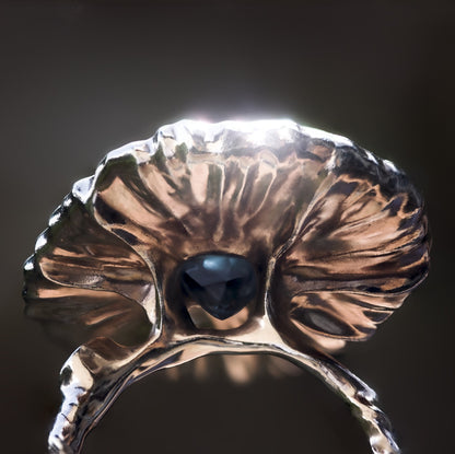 Nisi Floating Island Ring with hidden blue topaz