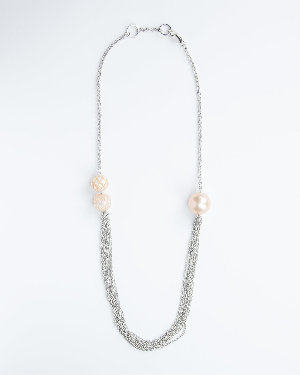 Silver chain necklace with two crafted and one semi-round Freshwater Pearl
