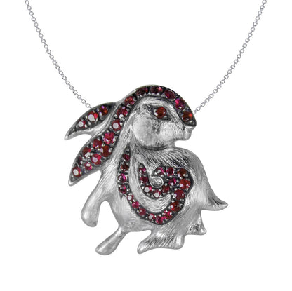 Rabbit Pendant in Sterling Silver adorned with Rubies, displayed on a silver chain against a plain white background.