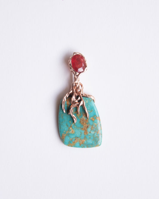 Lava Pendant II featuring free-form natural turquoise and oval-shaped orange sapphire set in 18k rose gold