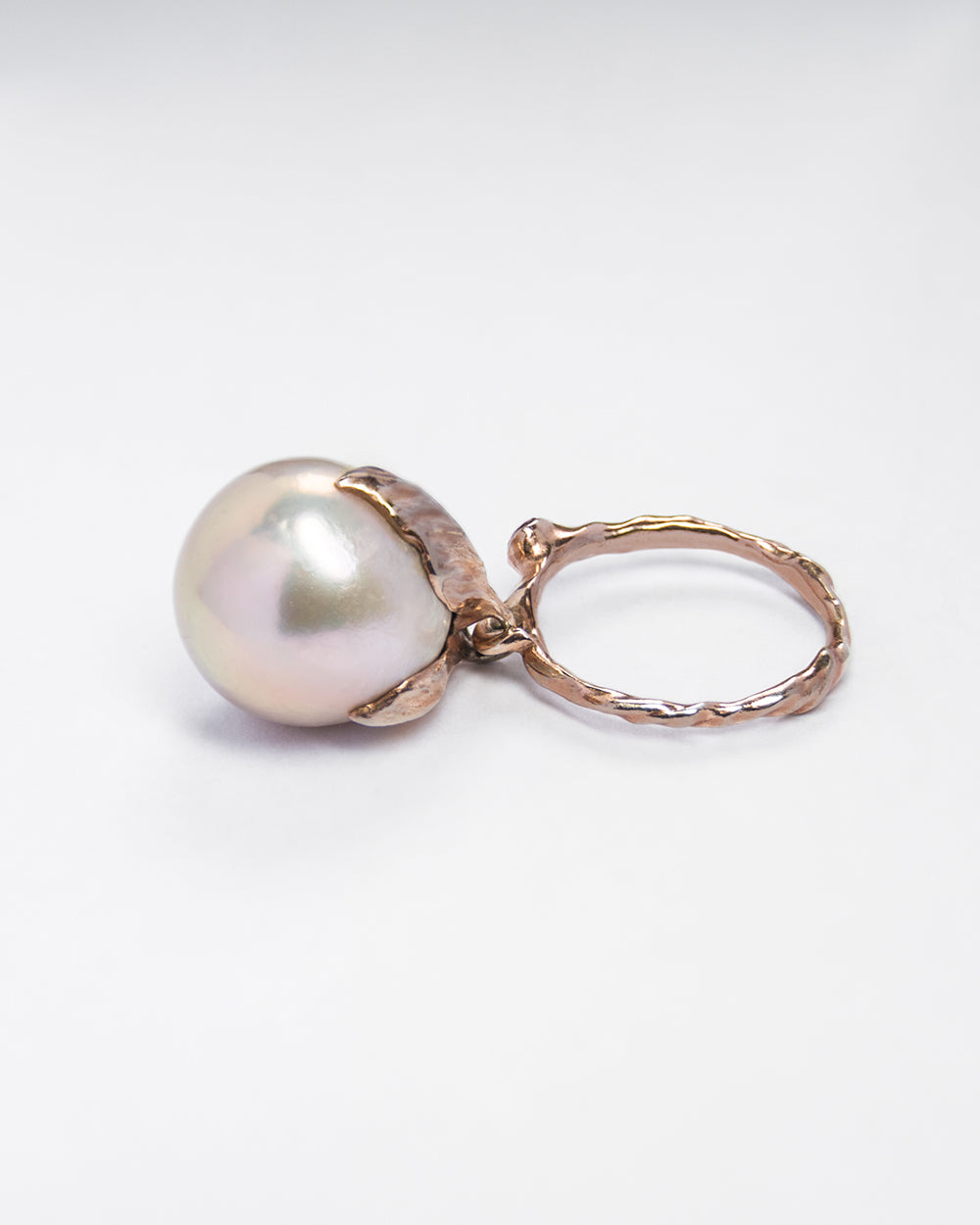 Sculpted details on Kara Ring in 18K Rose Gold with Freshwater Pearl and Ruby 