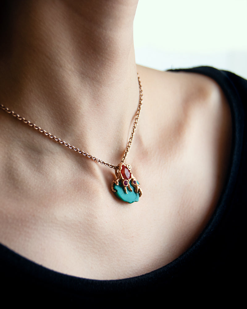 Discover our small Lava 18K Rose Gold Turquoise, Orange Sapphire, Ruby & Diamond Pendant worn on a Rose Gold chain