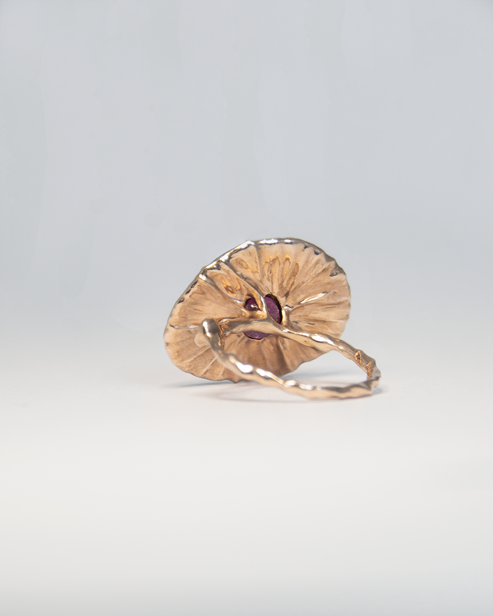 Back view of Nisi Island Ring in 18K Rose Gold with Gold-Sheen Sapphire