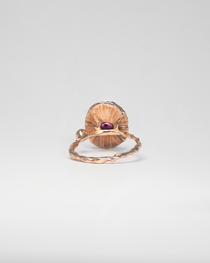 Back view of unique Nisi 18K Rose Gold ring featuring Pink Tourmaline under centre stone