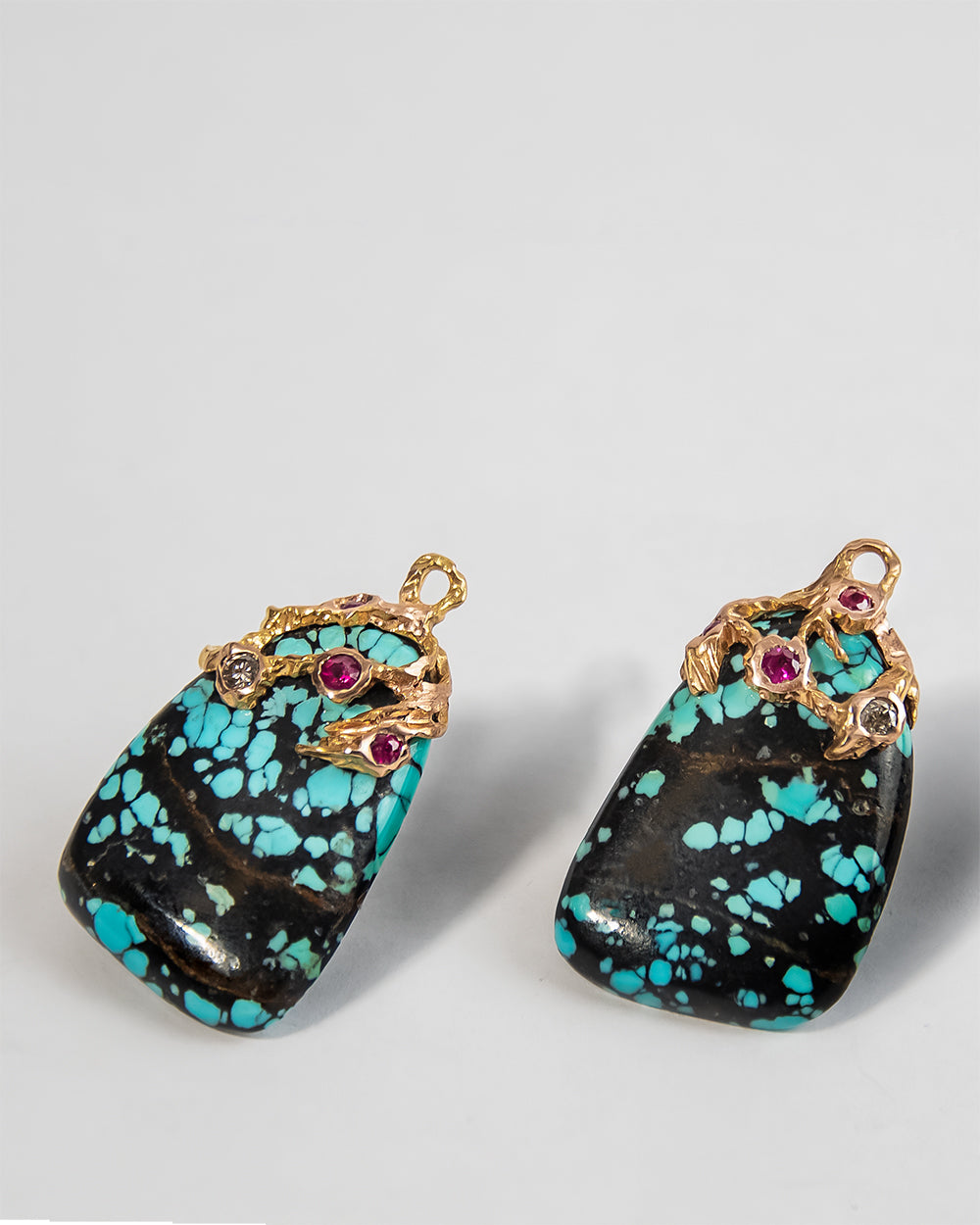 Lava detachable drops crafted from 18K Rose Gold featuring Turquoise, Rubies, and Diamonds
