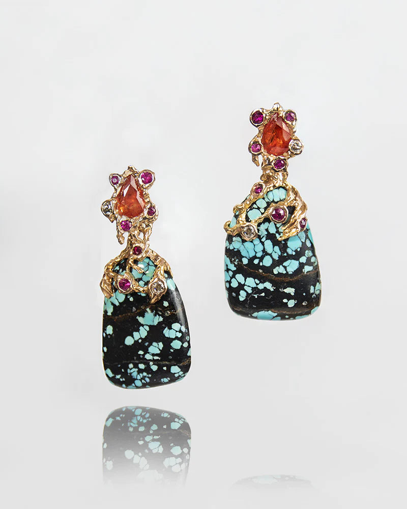 a pair of free-form 18K rose gold earrings, featuring turquoise, orange sapphires, rubies, and diamonds