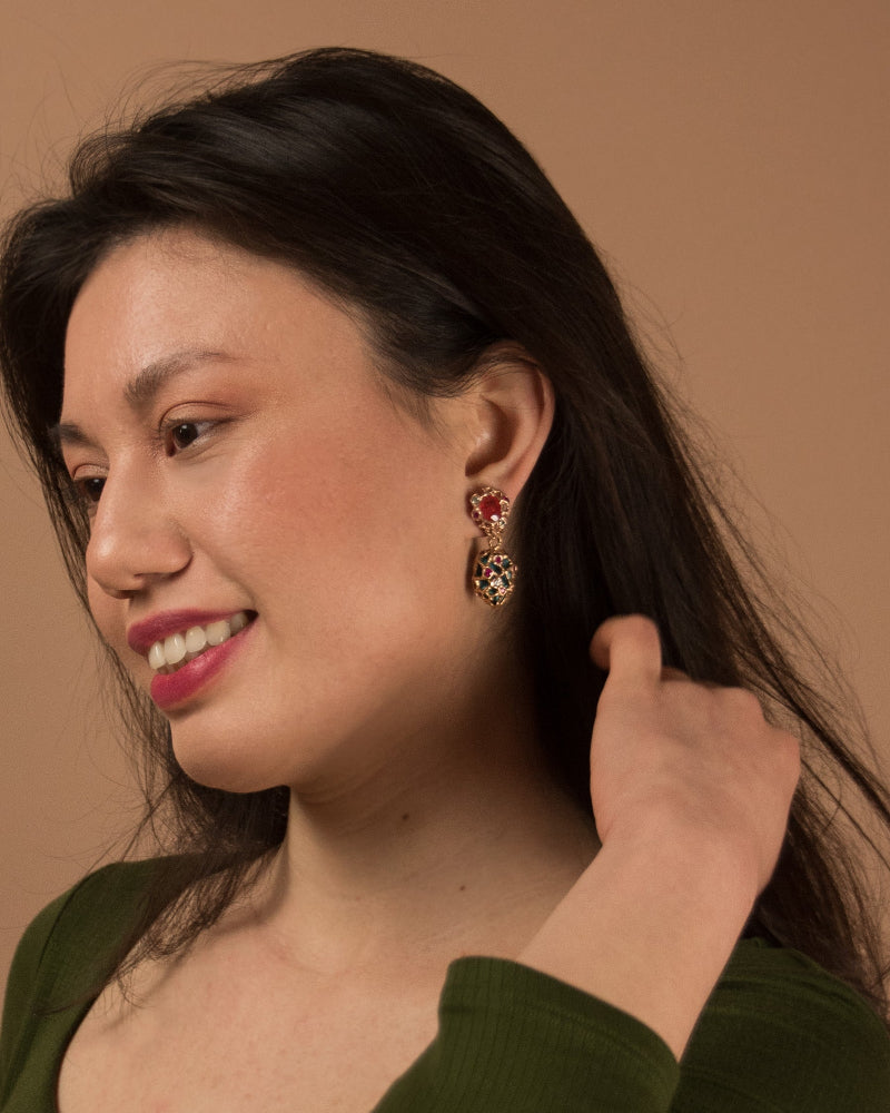 model showcasing detachable earrings worn in reverse as part of a casual outfit