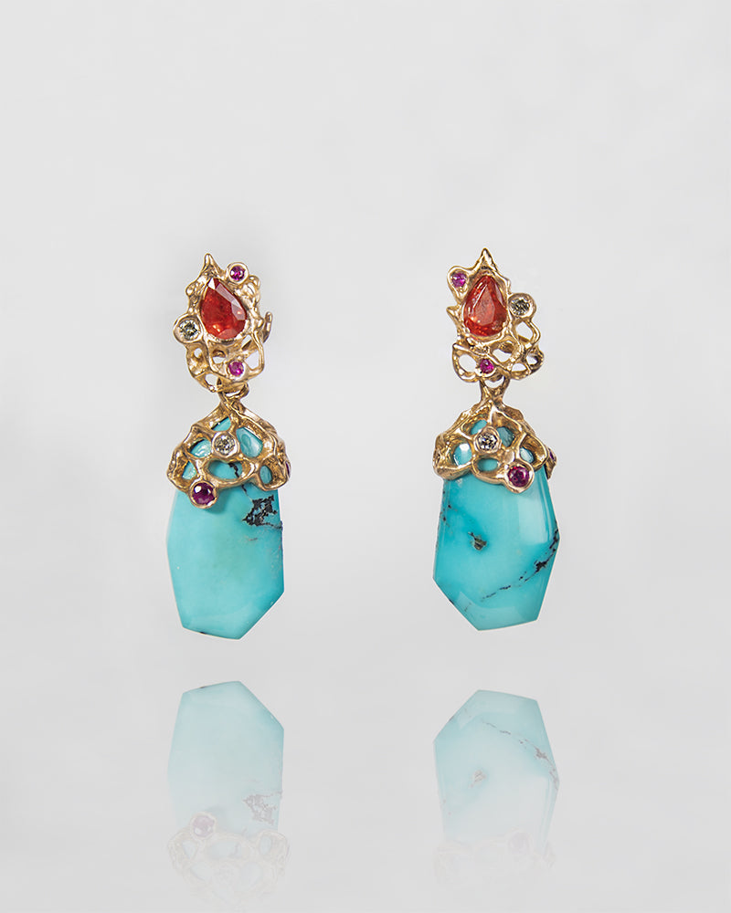 front view of Lava 18K Rose Gold Earrings with special-cut cabochon Turquoise, pear-cut faceted Orange Sapphires, round faceted Rubies & round faceted Diamonds