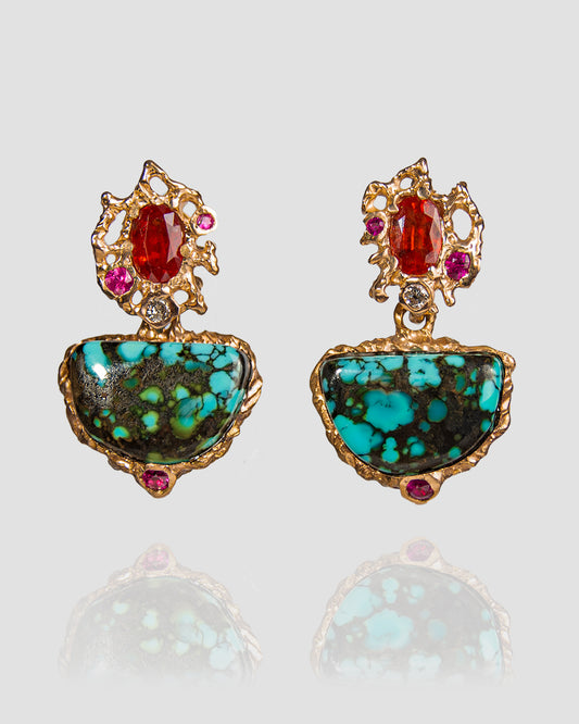 Front view of earrings with molten 18K rose gold setting, featuring turquoise, orange sapphire, ruby and diamond 