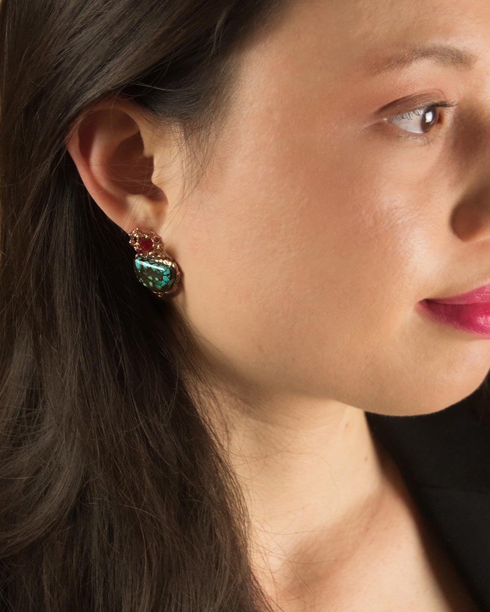 model wearing set of Lava detachable earrings with Spider-web Turquoise, Orange Sapphire, Ruby & Diamond set in 18K Rose Gold