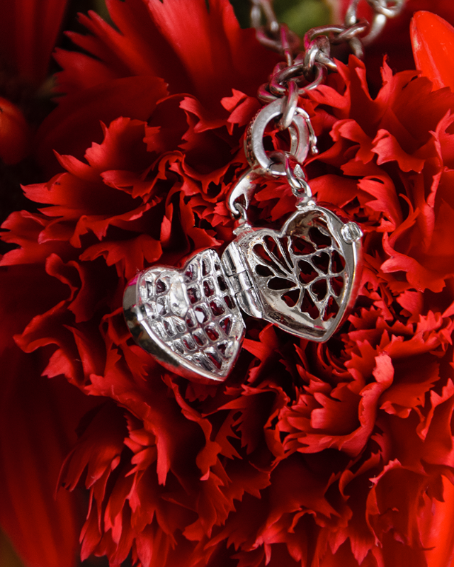 Opened Minaudière 18K White Gold Amethyst Heart Locket on a TVRRINI chain