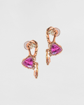 close-up of hoop earrings, featuring an abstract, organic setting that frames trillion-cut pink tourmaline and round faceted diamonds