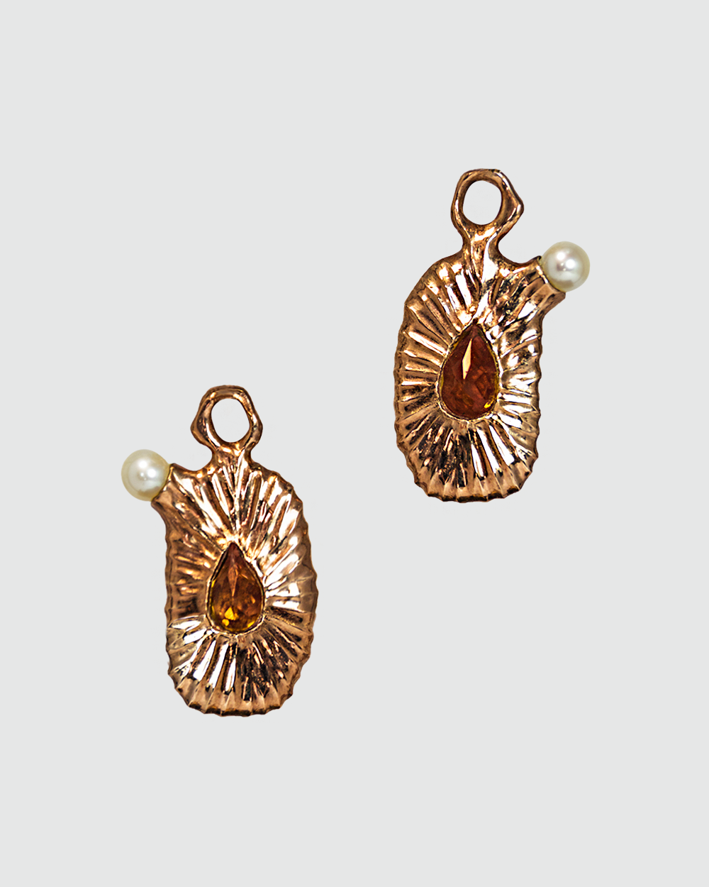 reverse of detachable earring drops with a hand-textured gold-plated silver setting, unveiling pear-cut citrines